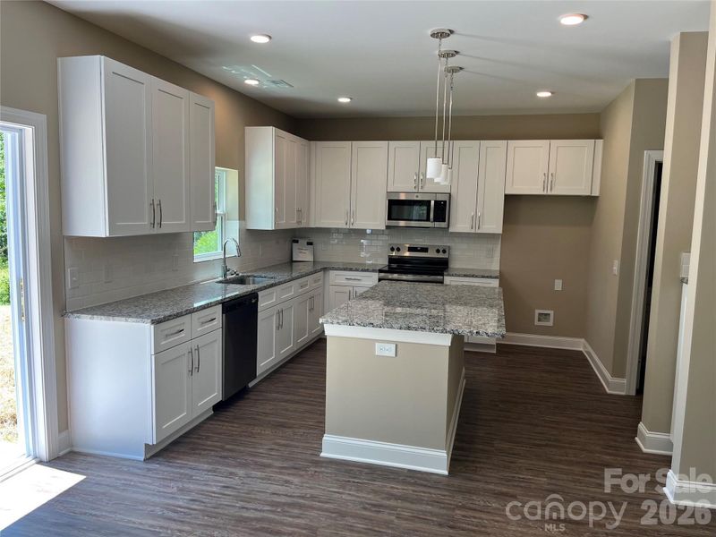 Furnished interior view inside a new home in , Statesville (Image 9).
