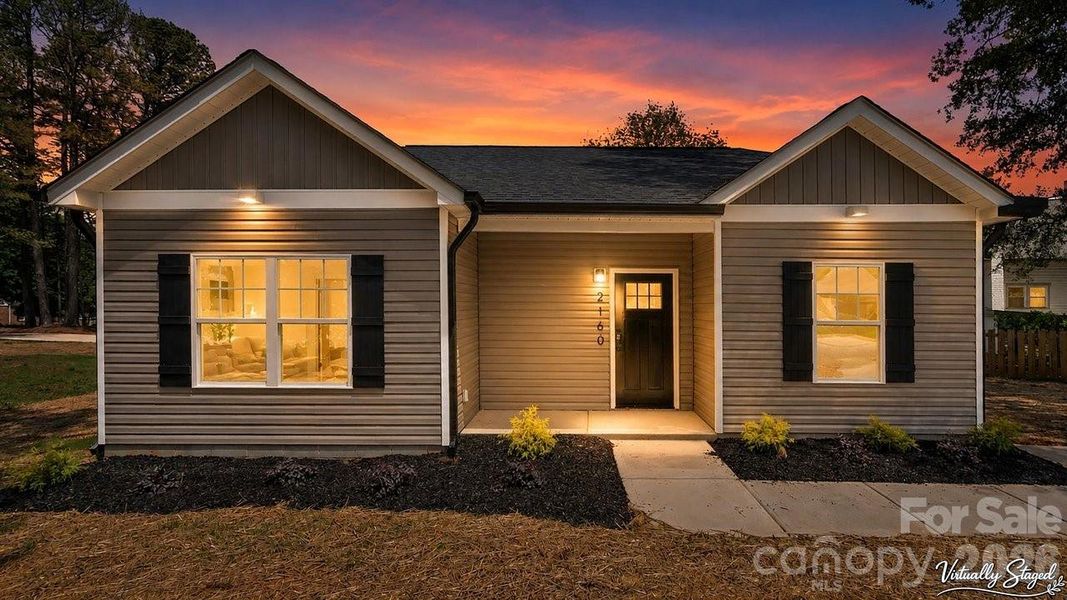 Front exterior of a new home in , Gastonia, NC, highlighting curb appeal (Image 14).