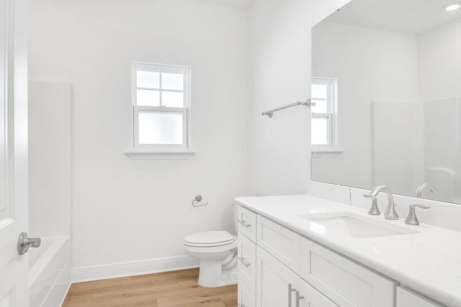 Furnished interior view inside a new home in The Bluffs at Lafayette, Freeport (Image 10).