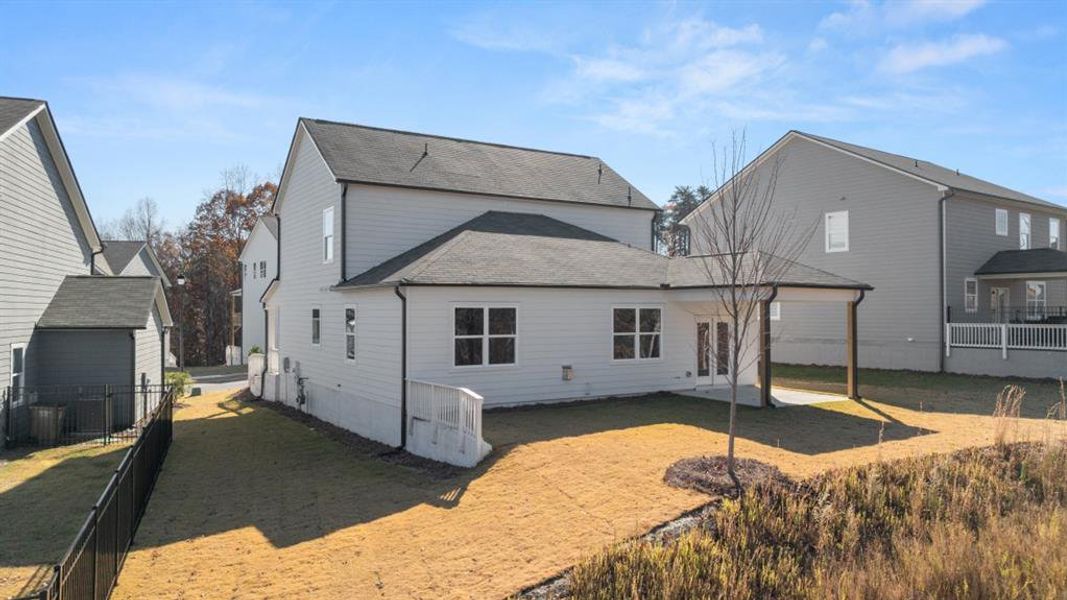 Exterior details and patio area of a home in Falcon Landing, Gainesville (Image 4).