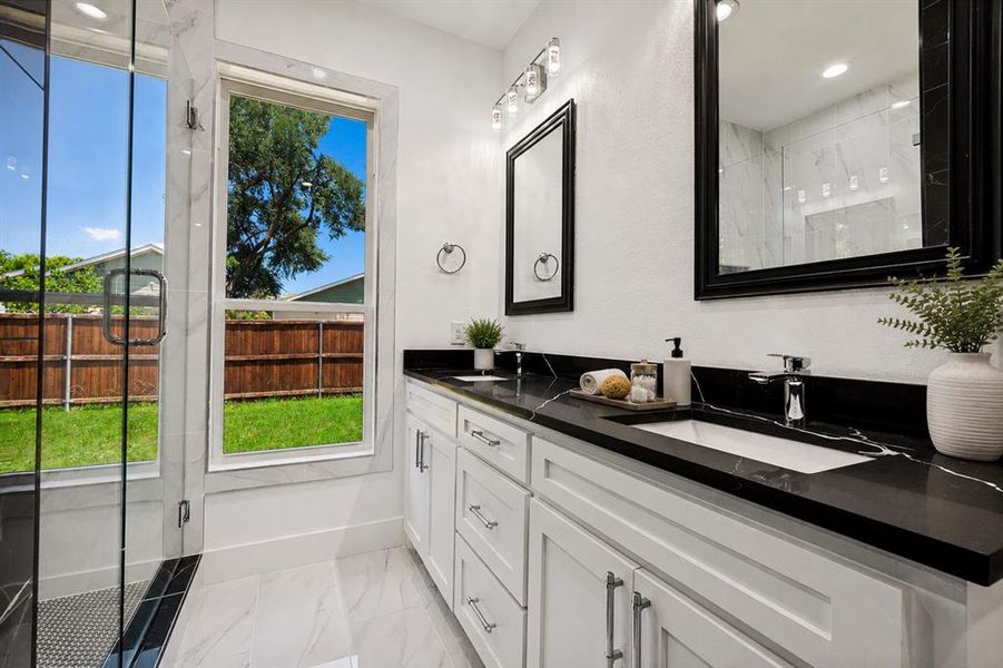Dual sinks frameless shower glass, granite counter tops Dual sinks frameless shower glass, granite counter tops