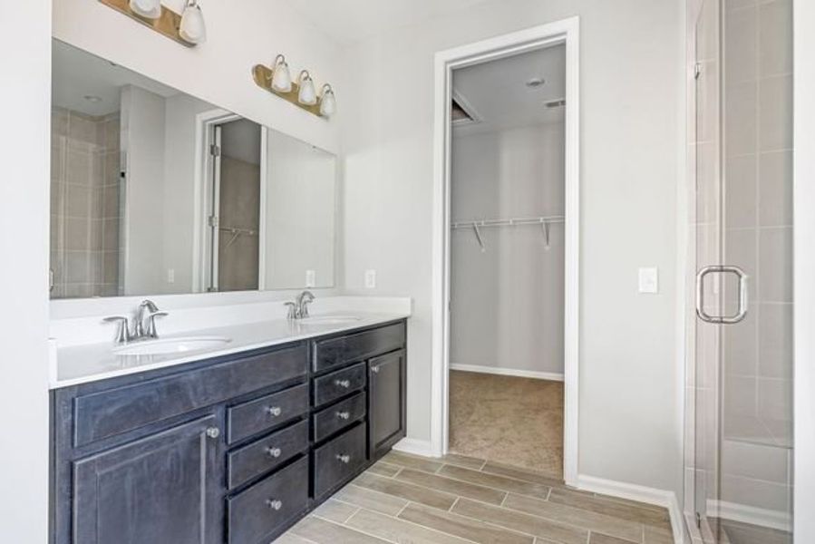 Representative furnished interior of a home built from the Winslow P by True Homes in Homecoming, Ravenel (Image 12).
