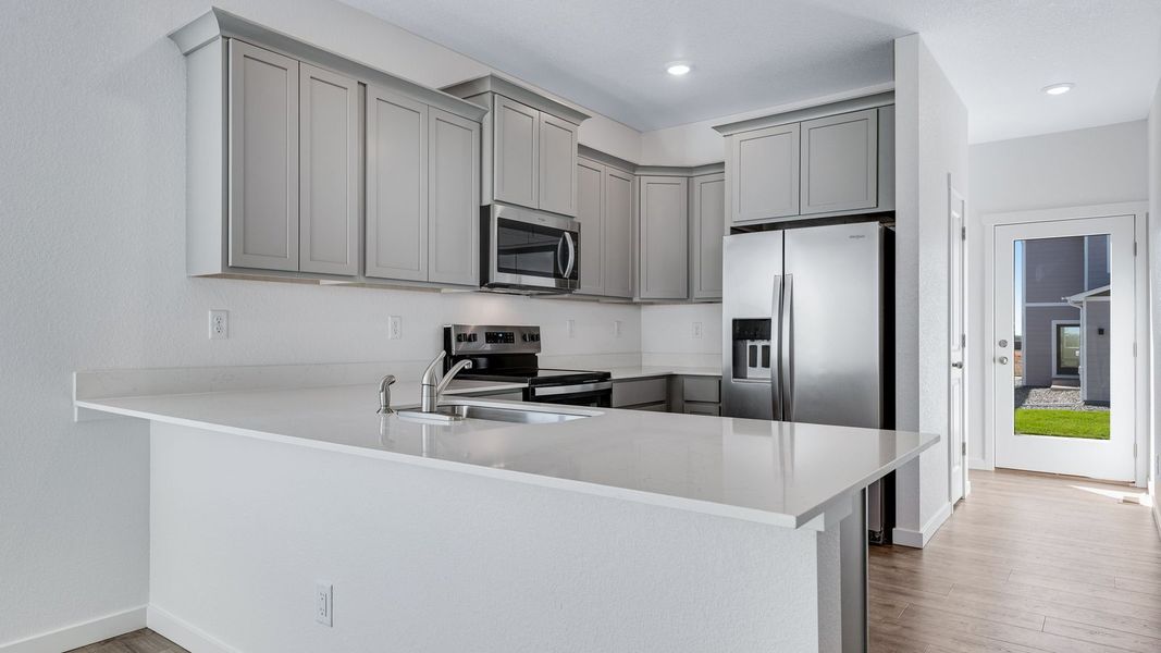 Furnished interior view inside a new home in Sky Ranch, Watkins (Image 3).