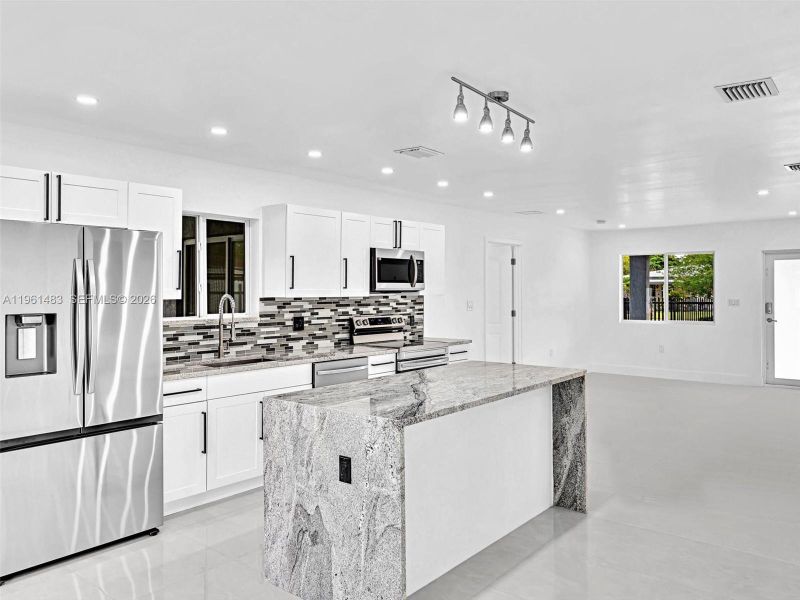 Furnished interior view inside a new home in , North Miami (Image 7).