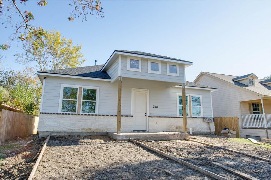 Front exterior of a new home in , Houston, TX, highlighting curb appeal (Image 7).