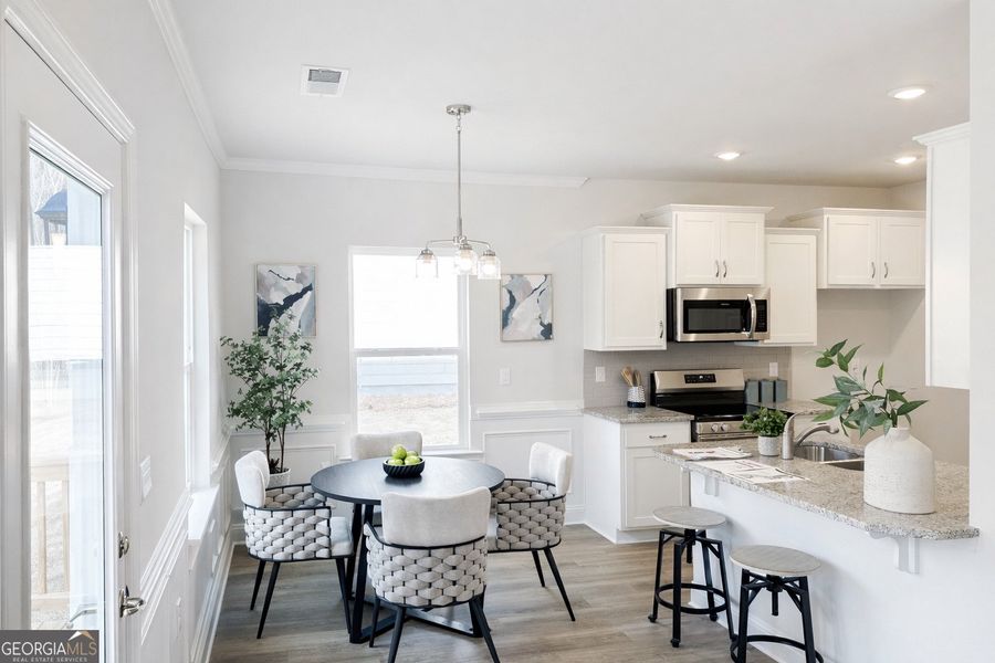 Furnished interior view inside a new home in Canterbury Villas, Carrollton (Image 6).