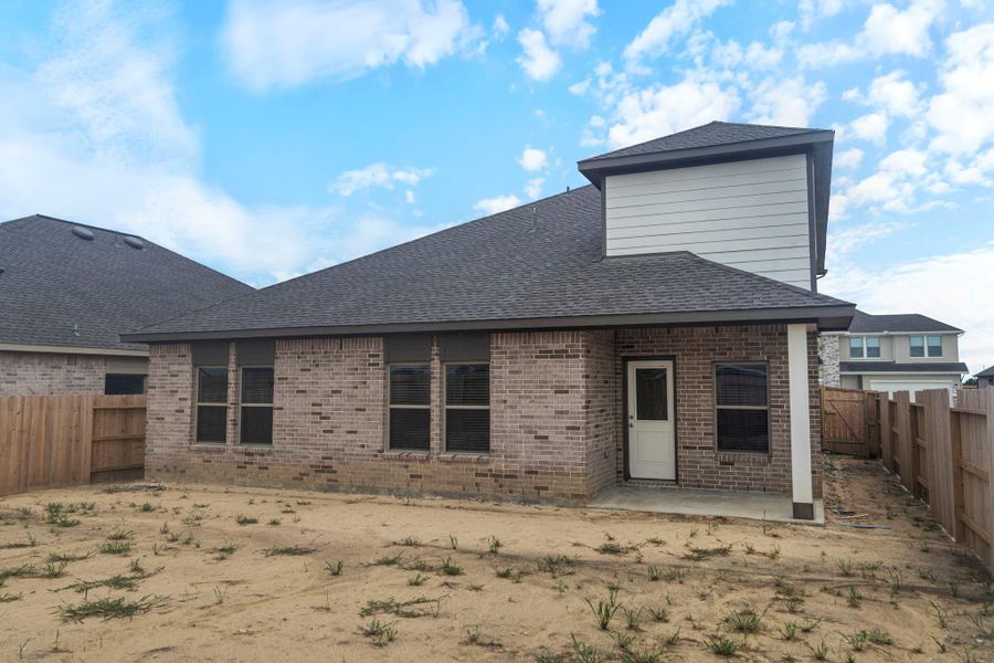 Front exterior of a new home in River Ranch Trails, Dayton, TX, highlighting curb appeal (Image 1). Front exterior of a new home in River Ranch Trails, Dayton, TX, highlighting curb appeal (Image 1).