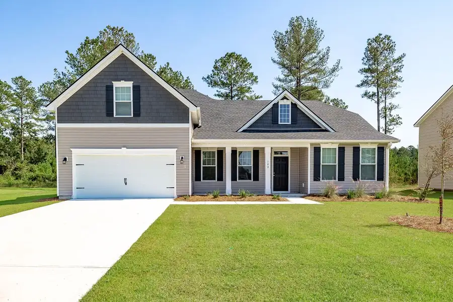 Front exterior of a new home in Settlers Hammock, Kingsland, GA, highlighting curb appeal (Image 2). Front exterior of a new home in Settlers Hammock, Kingsland, GA, highlighting curb appeal (Image 2).
