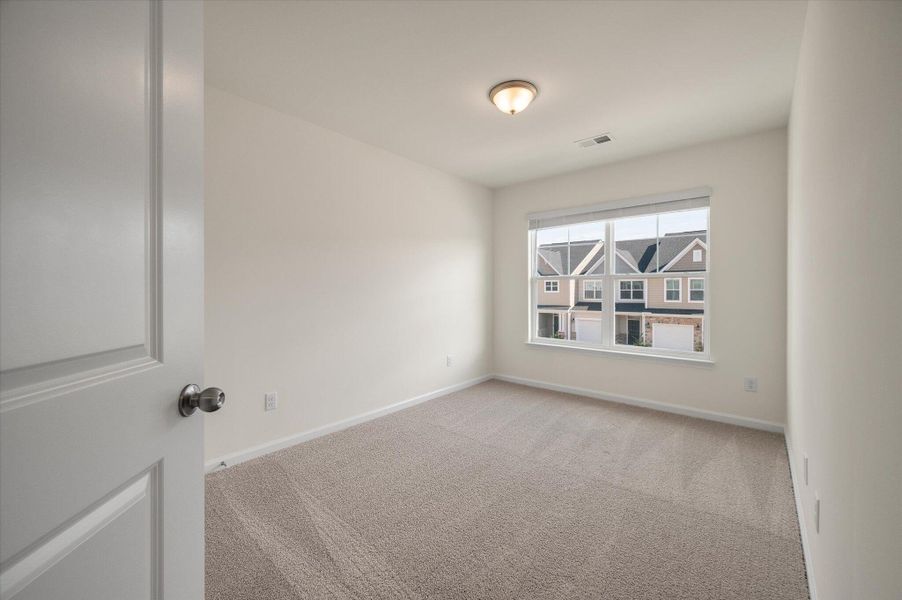 Spacious, unfurnished interior of a new home in The Landings at Montague, Goose Creek (Image 16).