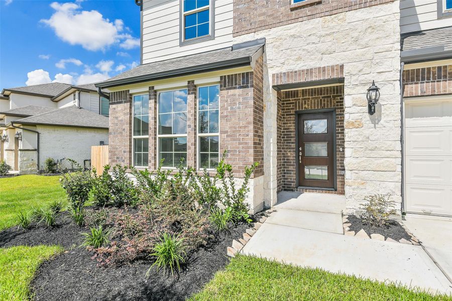 Exterior details and patio area of a home in Stone Creek Ranch, Hockley (Image 4).
