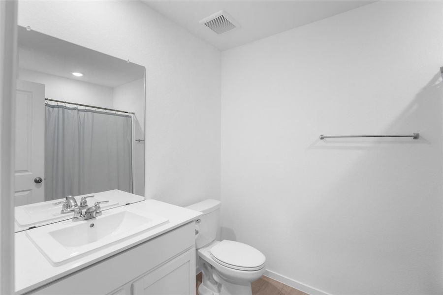 Well-maintained full bathroom with clean, functional finishes.