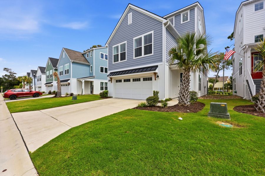 Front exterior of a new home in , North Myrtle Beach, SC, highlighting curb appeal (Image 2). Front exterior of a new home in , North Myrtle Beach, SC, highlighting curb appeal (Image 2).