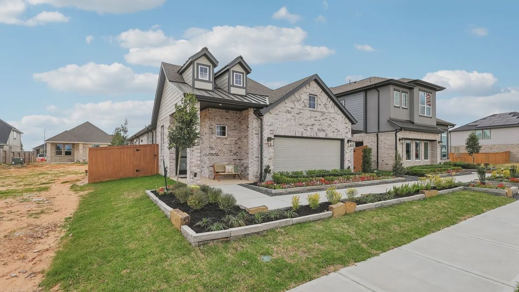 Representative exterior photo of a completed home built from the Adele by Chesmar Homes in Elyson 60's, Katy, TX (Image 21).