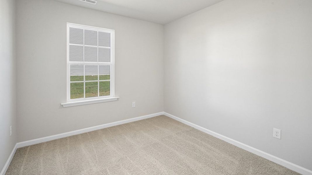 Representative unfurnished interior of a home built from the FREEPORT by D.R. Horton in River's Edge, Mayodan (Image 11).