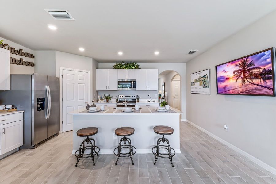 Representative furnished interior of a home built from the Cali by D.R. Horton in Magnolia Landing Express, North Fort Myers (Image 9).