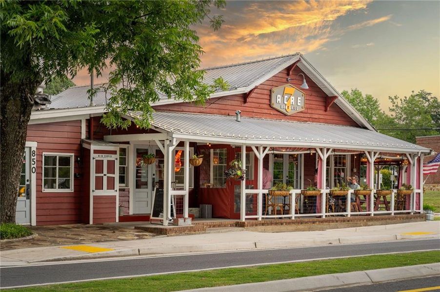 Front exterior of a new home in Echo at Crabapple, Milton, GA, highlighting curb appeal (Image 28). Front exterior of a new home in Echo at Crabapple, Milton, GA, highlighting curb appeal (Image 28).
