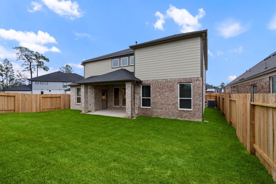 Exterior details and patio area of a home in Barton Creek Ranch, Conroe (Image 14). Exterior details and patio area of a home in Barton Creek Ranch, Conroe (Image 14).