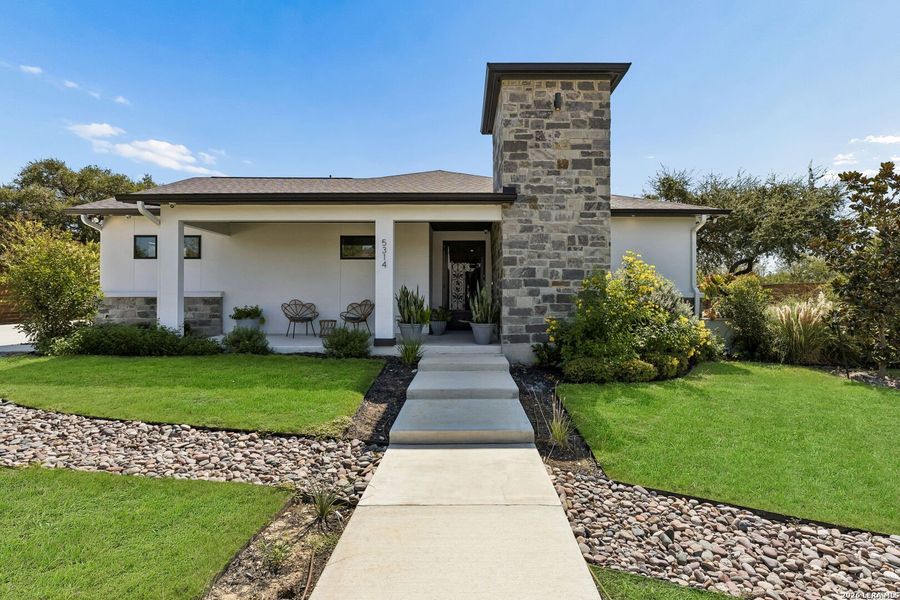 Front exterior of a new home in , Leon Valley, TX, highlighting curb appeal (Image 25).