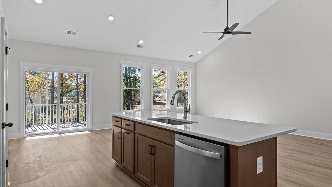 First-class finishes and a thoughtfully scaled island highlight this elegant kitchen space First-class finishes and a thoughtfully scaled island highlight this elegant kitchen space