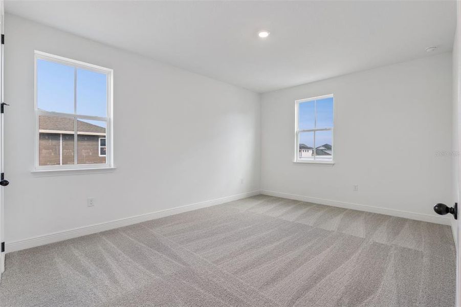 Spacious, unfurnished interior of a new home in Laureate Park (Craft Homes), Orlando (Image 29).