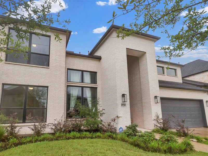 Front exterior of a new home in , Richmond, TX, highlighting curb appeal (Image 20). Front exterior of a new home in , Richmond, TX, highlighting curb appeal (Image 20).