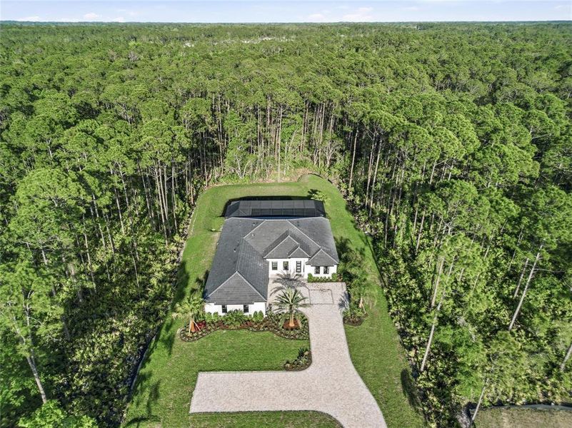 Front exterior of a new home in , Ormond Beach, FL, highlighting curb appeal (Image 21).