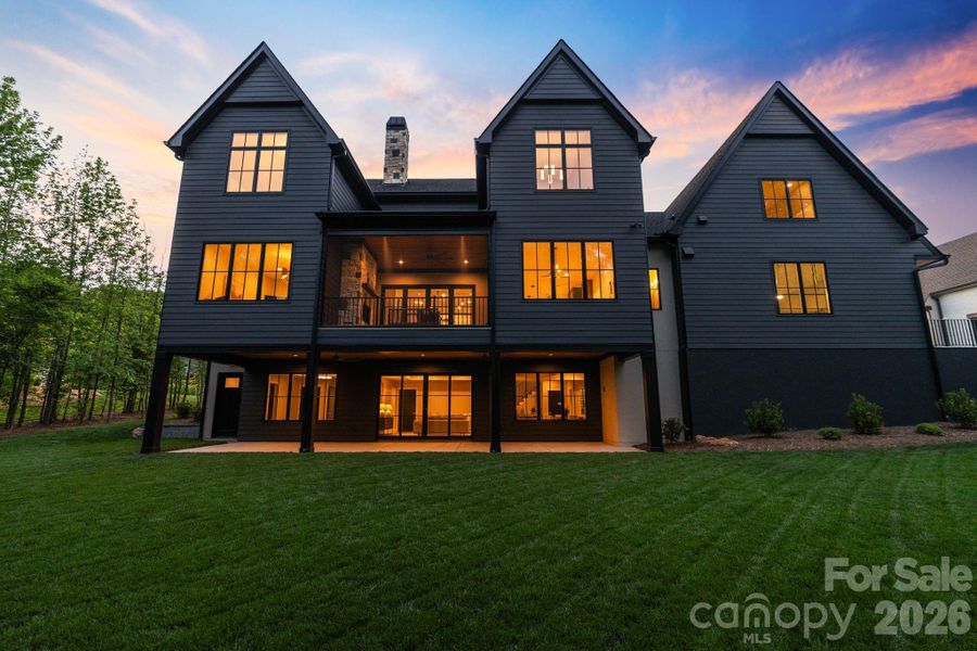 Front exterior of a new home in Cardinal Crest, Weddington, NC, highlighting curb appeal (Image 28). Front exterior of a new home in Cardinal Crest, Weddington, NC, highlighting curb appeal (Image 28).