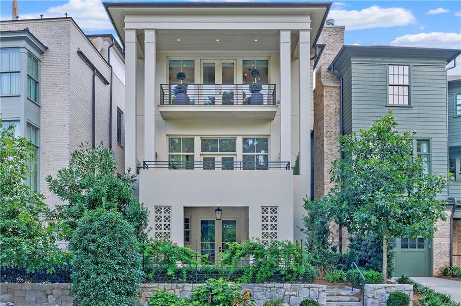 Front exterior of a new home in Delmont, Atlanta, GA, highlighting curb appeal (Image 1).