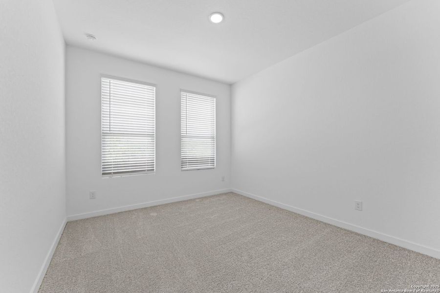 Spacious, unfurnished interior of a new home in Waterwheel: Coastline Collection, San Antonio (Image 12).