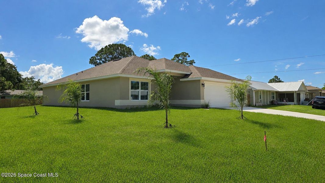 Exterior details and patio area of a home in Palm Bay, Palm Bay (Image 17).