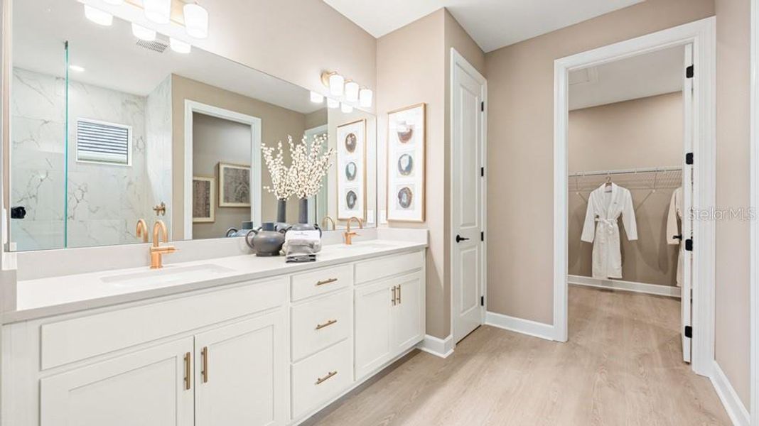 Furnished interior view inside a new home in Esplanade at Starling, Punta Gorda (Image 15).