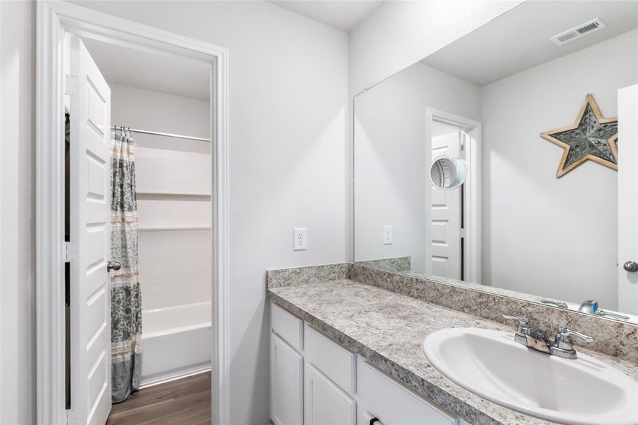Furnished interior view inside a new home in Granger Pines, Conroe (Image 31).