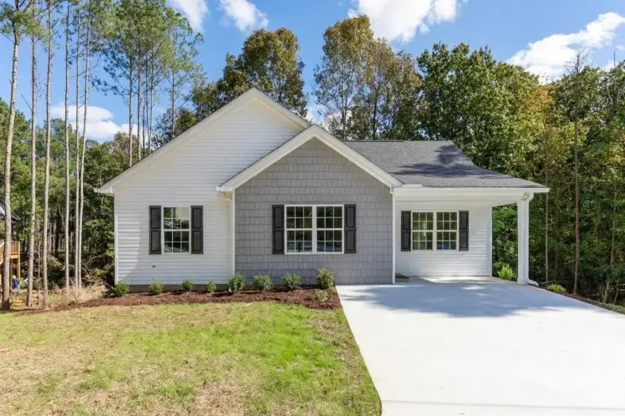 Front exterior of a new home in , Lula, GA, highlighting curb appeal (Image 23).