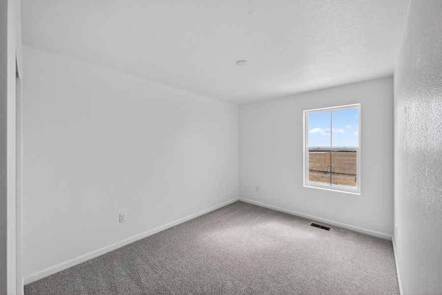 Spacious, unfurnished interior of a new home in Trailstone, Arvada (Image 15).