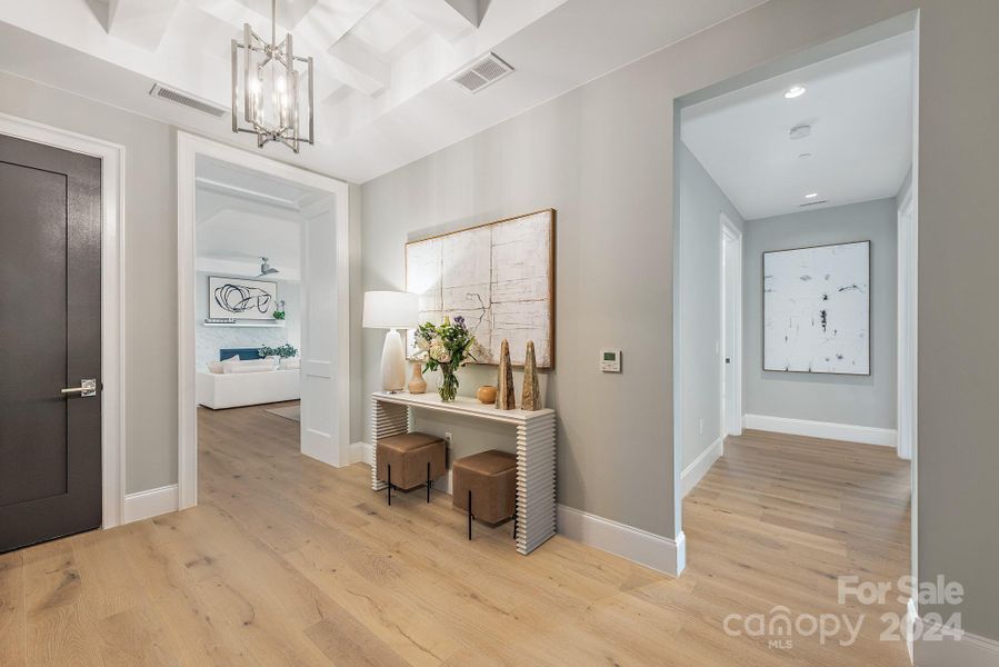 The entry foyer divides the guest area from the living space.