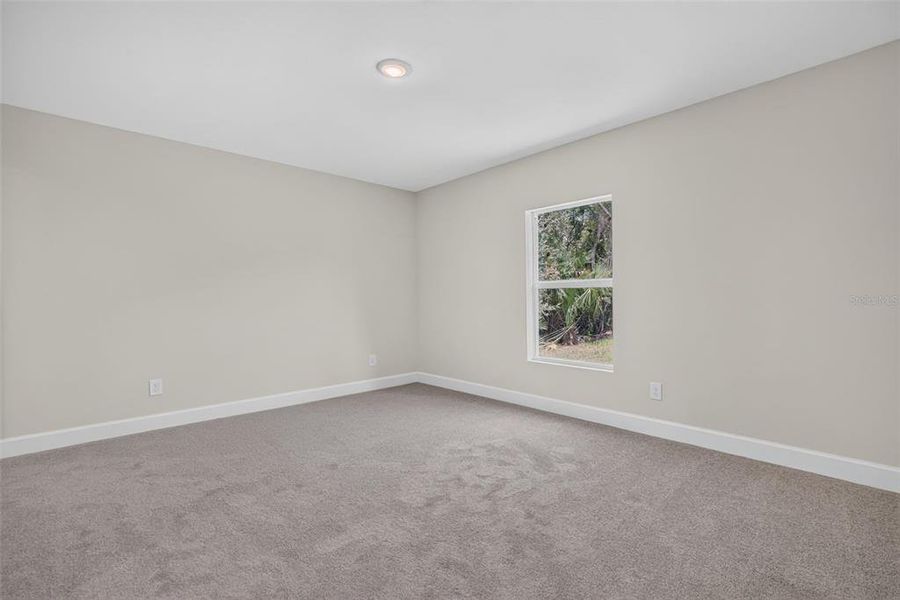 Spacious, unfurnished interior of a new home in , Port Charlotte (Image 16).