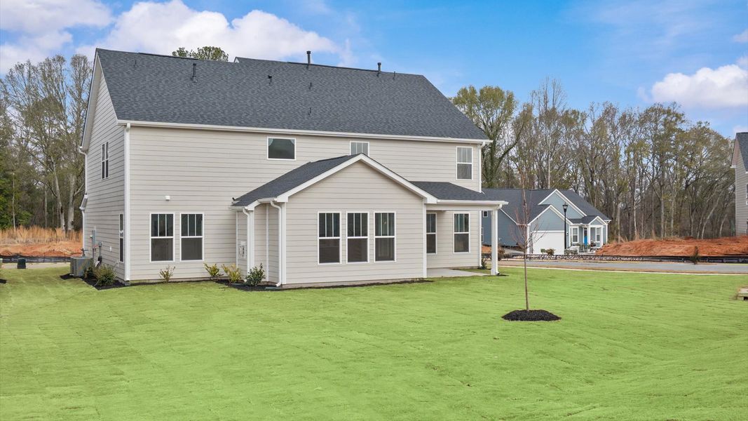 First-class design featuring a rear covered porch and tasteful architectural details
