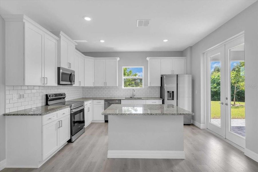 Furnished interior view inside a new home in , Punta Gorda (Image 11). Furnished interior view inside a new home in , Punta Gorda (Image 11).