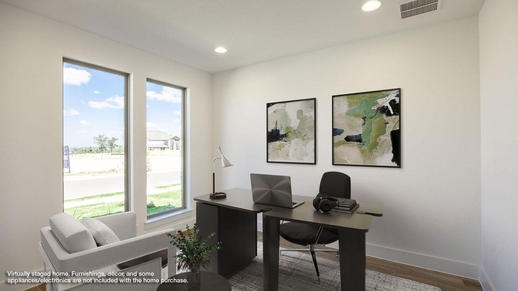 Office area featuring wood finished floors and recessed lighting
