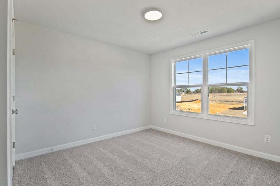 Representative unfurnished interior of a home built from the Camellia by Caviness & Cates Communities in Bartlett Manor, Youngsville (Image 61).