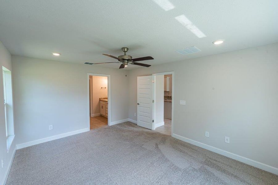 Furnished interior view inside a new home in Bayshore, Port St. Lucie (Image 14). Furnished interior view inside a new home in Bayshore, Port St. Lucie (Image 14).