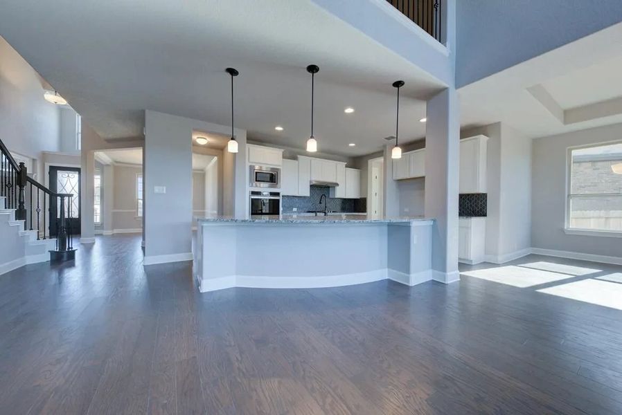 Image 8 representing the Barnett by Ashton Woods in Megan's Landing 70's, Castroville, TX.