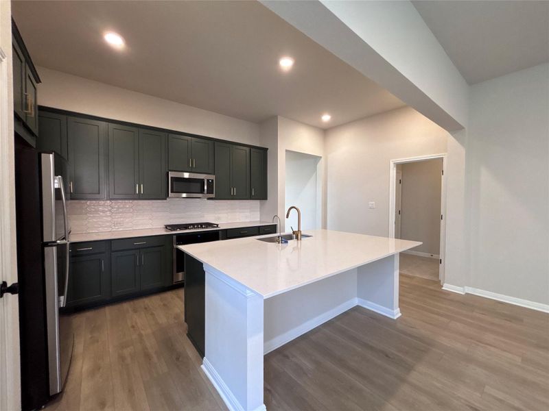 Furnished interior view inside a new home in The Colony 50s, Cedar Creek (Image 6).