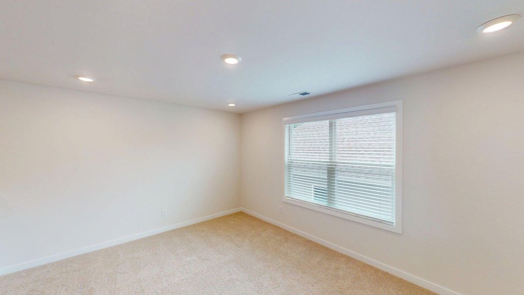 Representative unfurnished interior of a home built from the Cedar by D.R. Horton in Westport, York (Image 43).