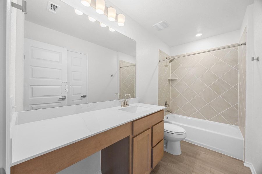 Furnished interior view inside a new home in Retreat at San Gabriel, Georgetown (Image 8).