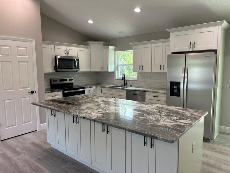 Furnished interior view inside a new home in , Dunnellon (Image 12).