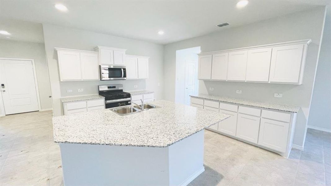 Kitchen - All Home and community information, including pricing, included features, terms, availability and amenities, are subject to change at any time without notice or obligation. All Drawings, pictures, photographs, video, square footages, floor plans, elevations, features, colors and sizes are approximate for illustration purposes only and will vary from the homes as built.