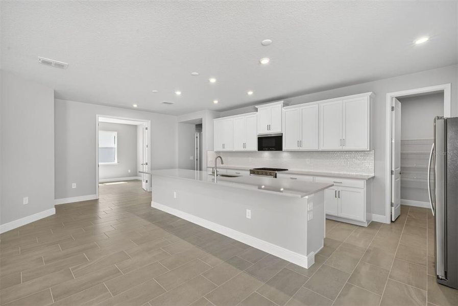 Furnished interior view inside a new home in Wellen Park, Venice (Image 8).