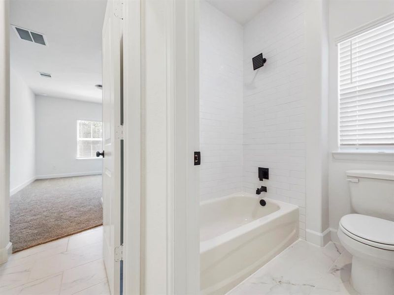 Secondary Bathroom, with access to two of the secondary bedrooms! (Sample photos of a completed Warwick floor plan. The image may feature alternative selections and/or upgrades.)