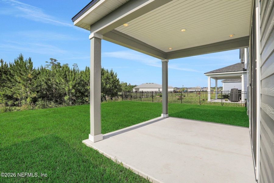 Exterior details and patio area of a home in Hyland Trail, Green Cove Springs (Image 34).